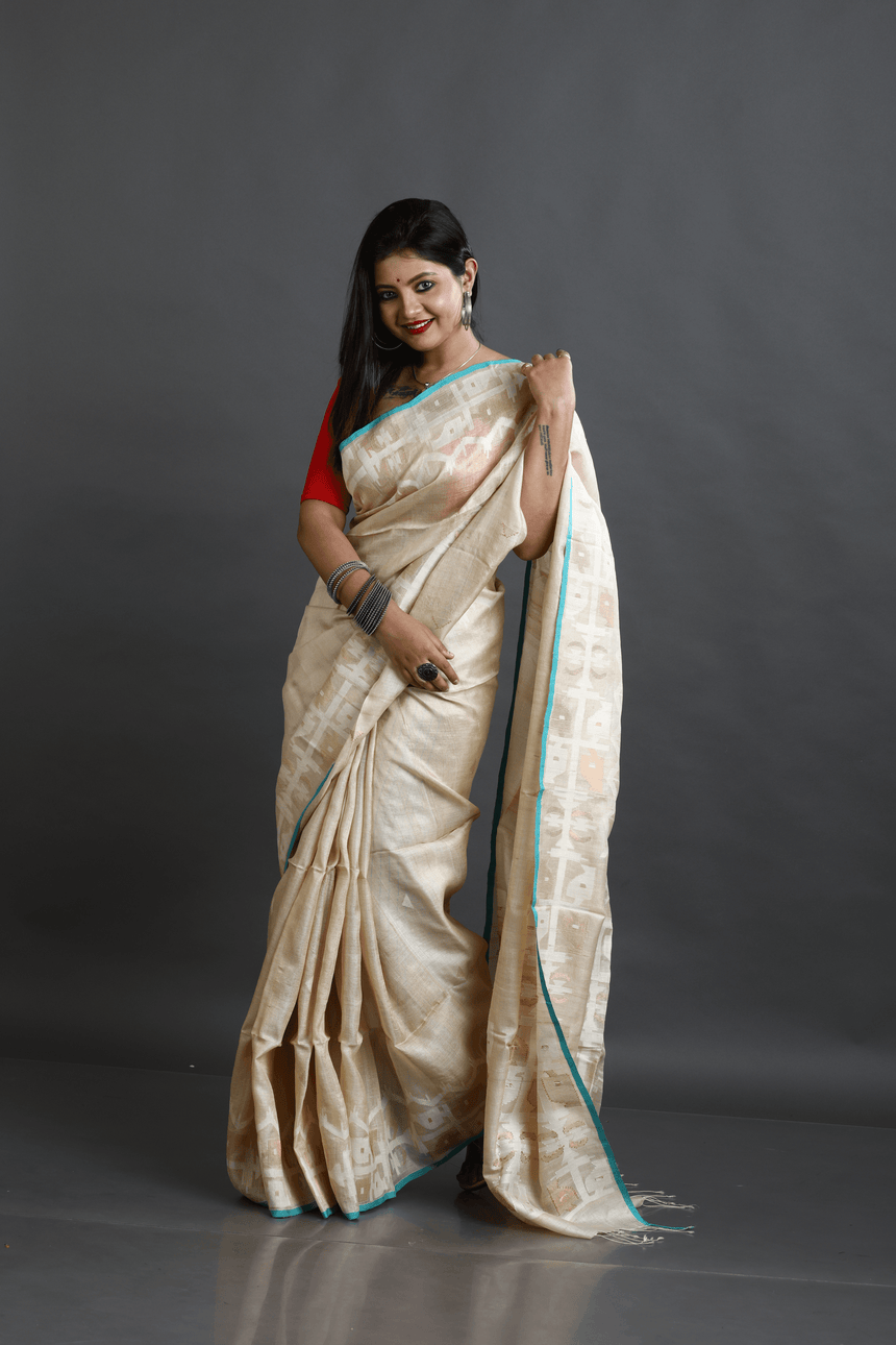 Beige with firoza border traditional handwoven jamdani saree in tusser silk - Tamal Boutique