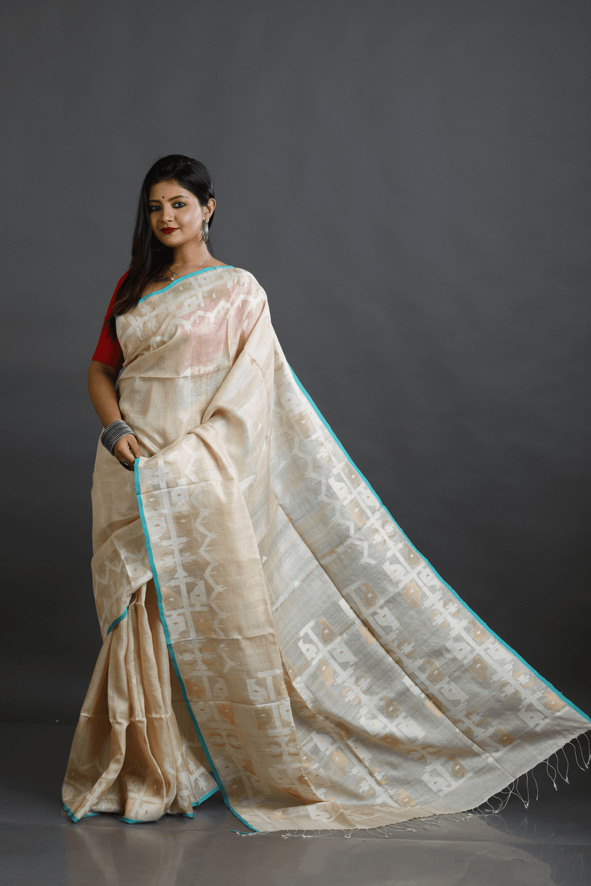 Beige with firoza border traditional handwoven jamdani saree in tusser silk - Tamal Boutique