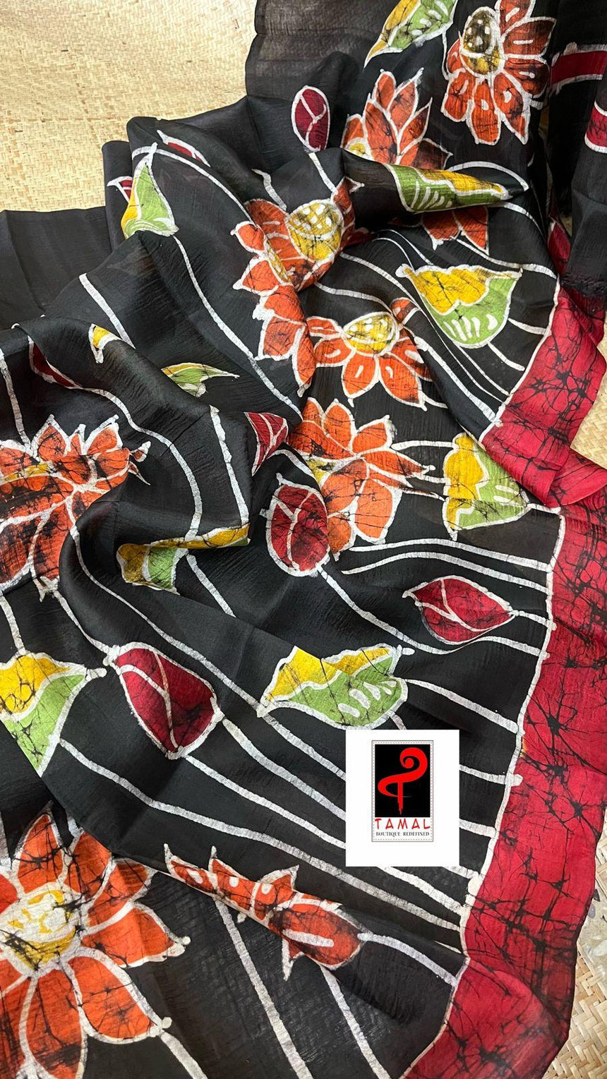 Black with red border lotus hand batik in katan silk saree
