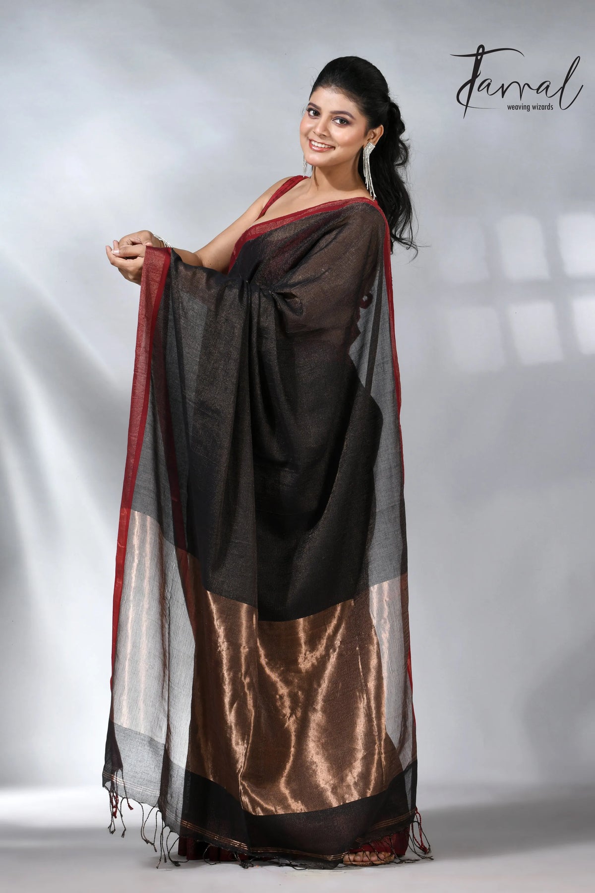 Black with red color border pure tissue linen handloom saree