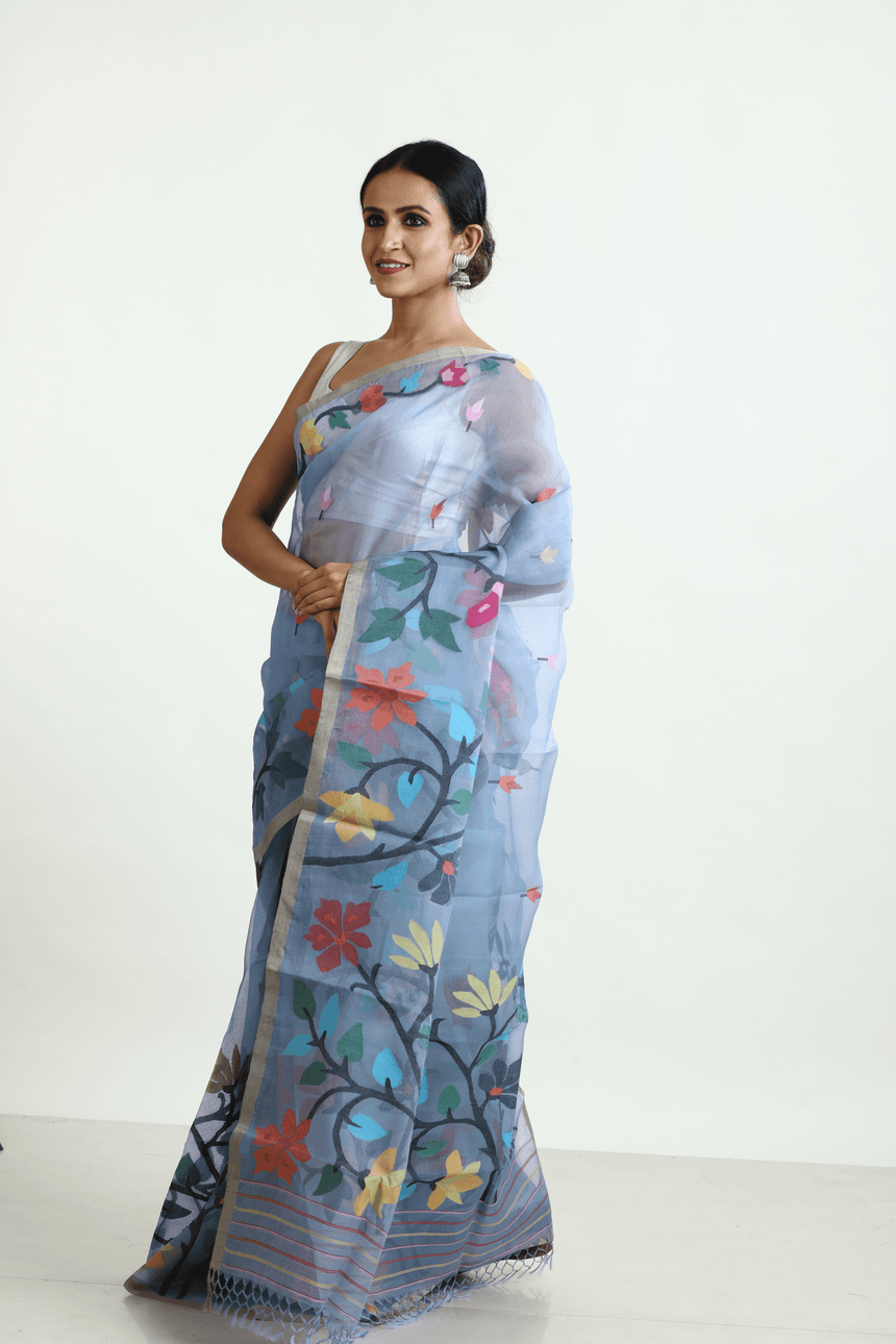 Blueish grey, jamdani saree, muslin silk,
handwoven, handwoven jamdani saree, floral border, clothing, boutique