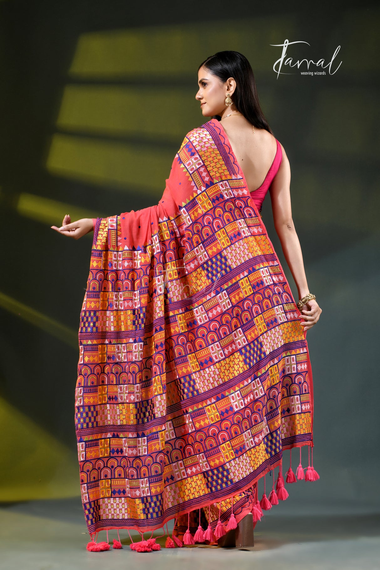 Deep peach with multicoloured lambani embroidery saree