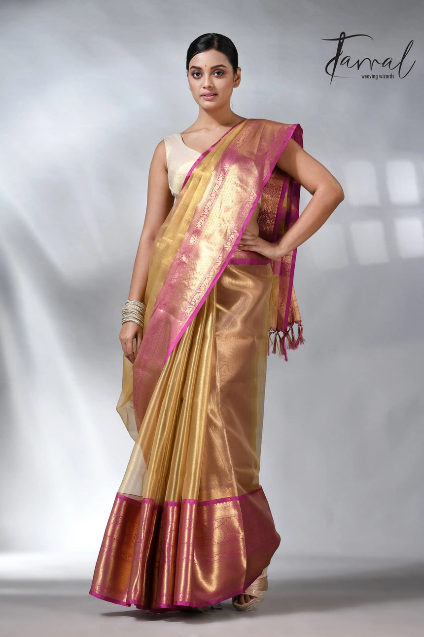 Exlore the Golden with the Pink colour in the Benarasi saree