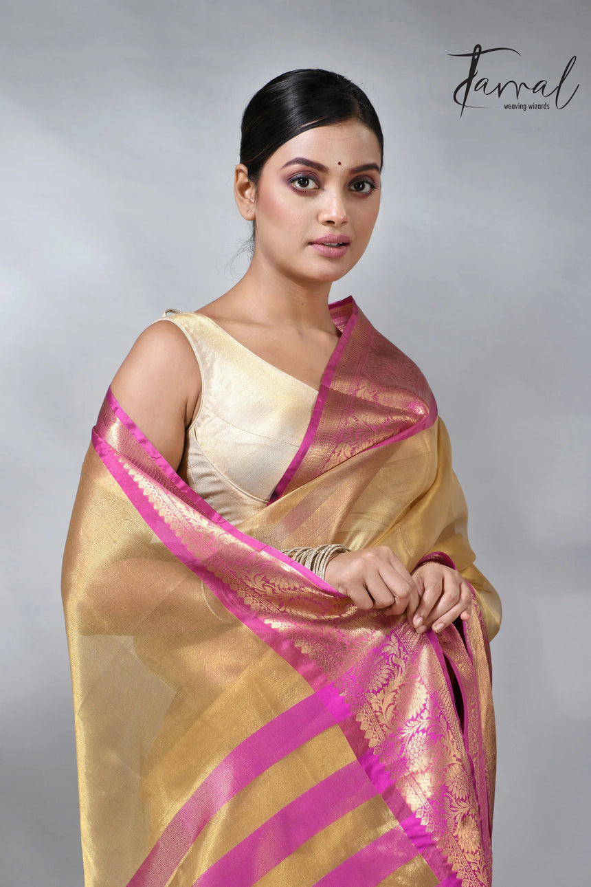 Exlore the Golden with the Pink colour in the Benarasi saree