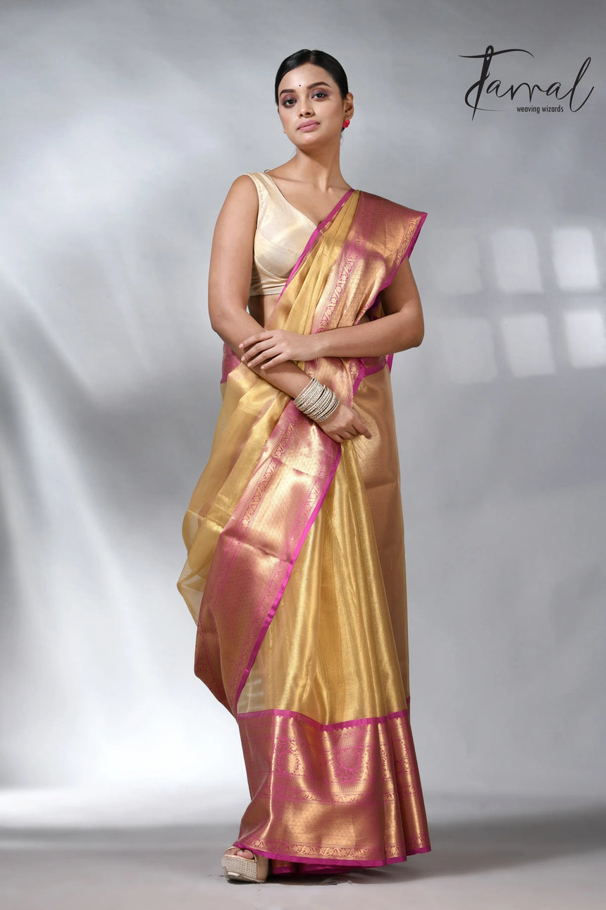 Exlore the Golden with the Pink colour in the Benarasi saree