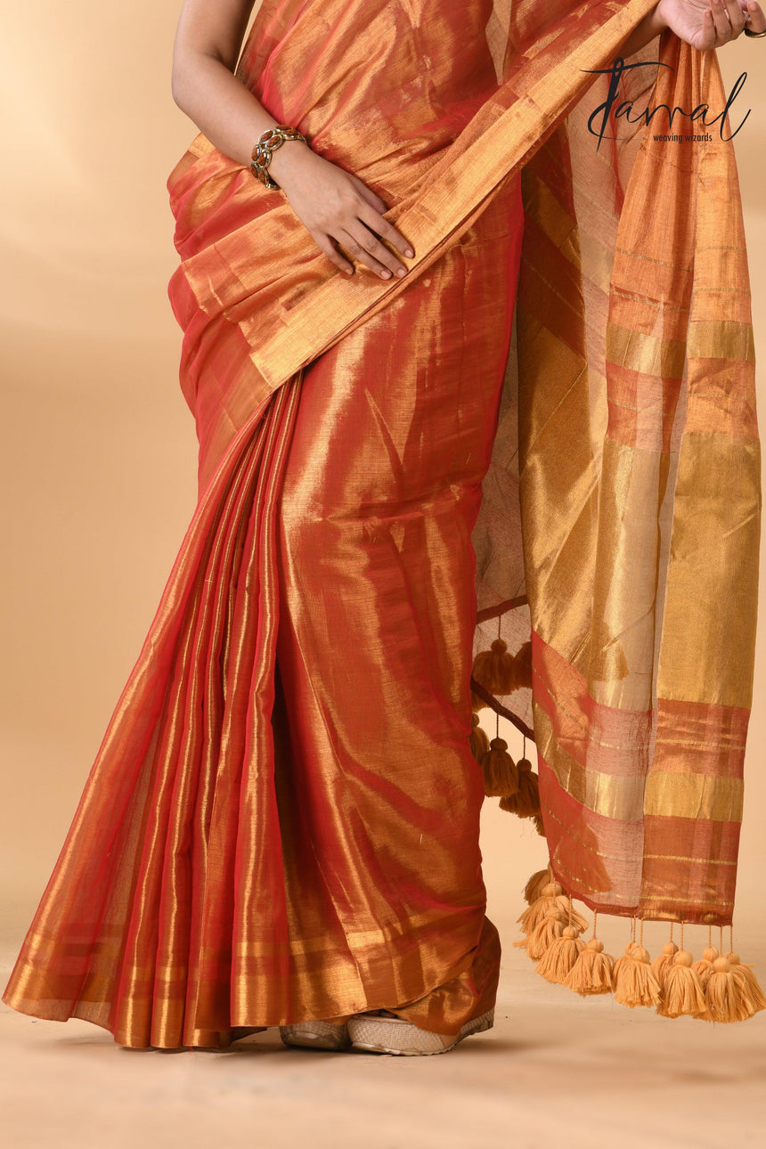 Golden orange tissue handloom saree bottom view