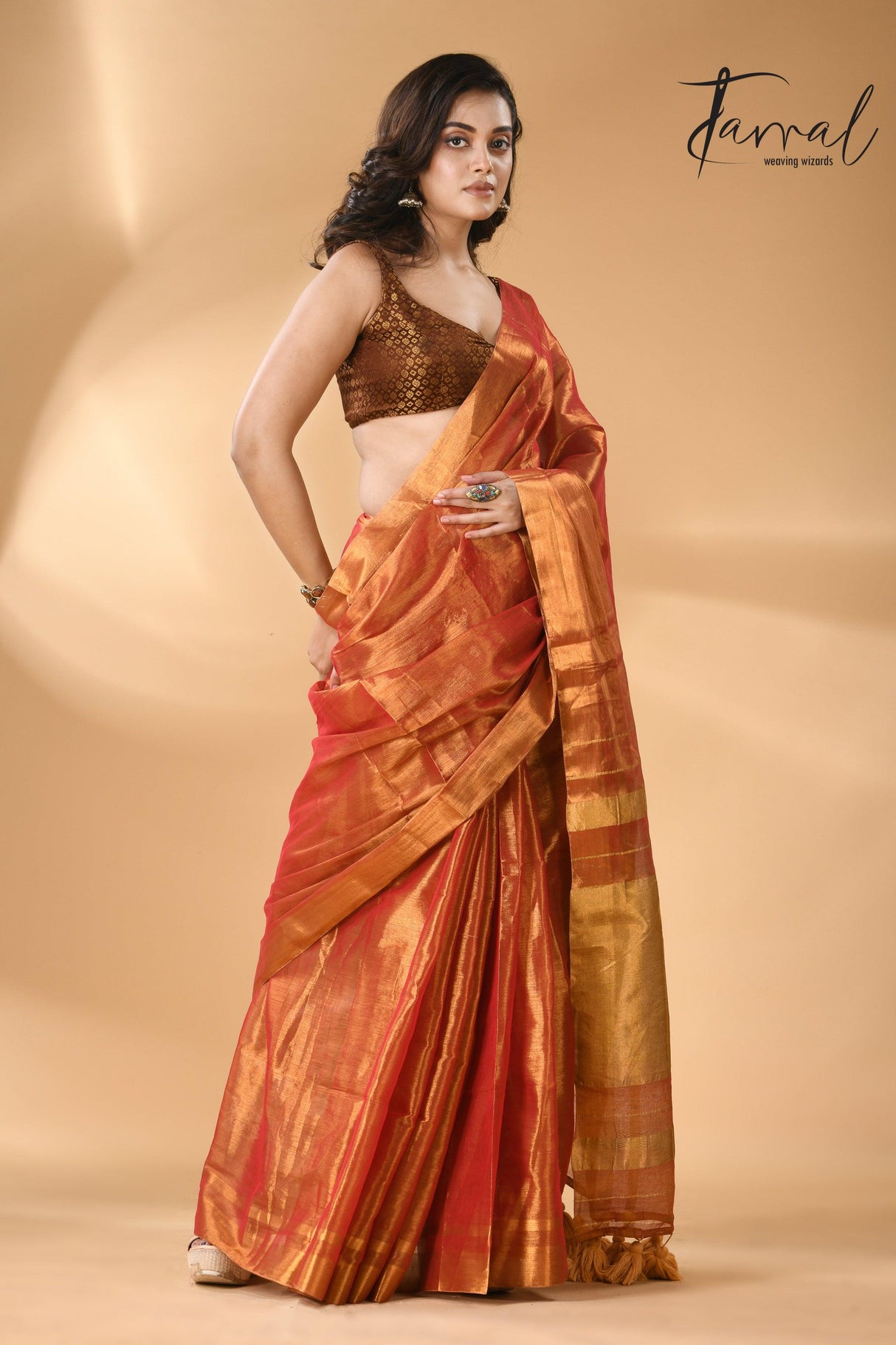 Golden orange tissue handloom saree left