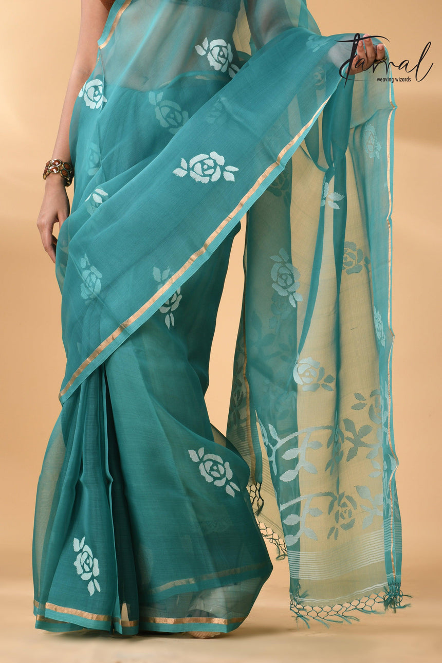 Handwoven needle work muslin silk jamdani saree with teal blue motifs bottom