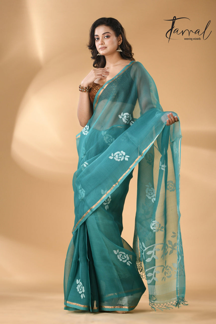 Handwoven needle work muslin silk jamdani saree with teal blue motifs left