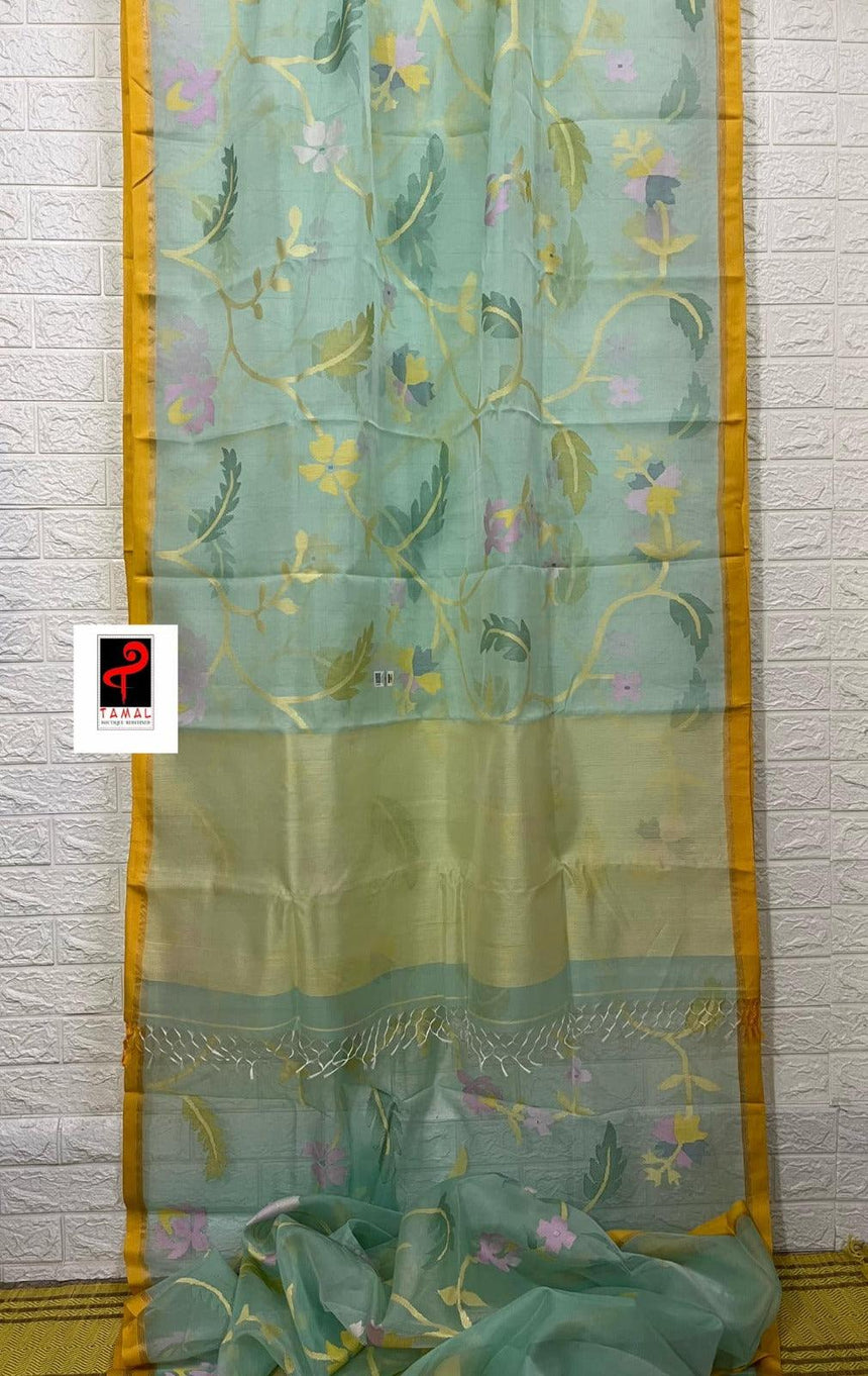 Light Firoza with yellow border allover hibiscus & other floral motifs handwoven jamdani saree in muslin silk - Tamal Boutique