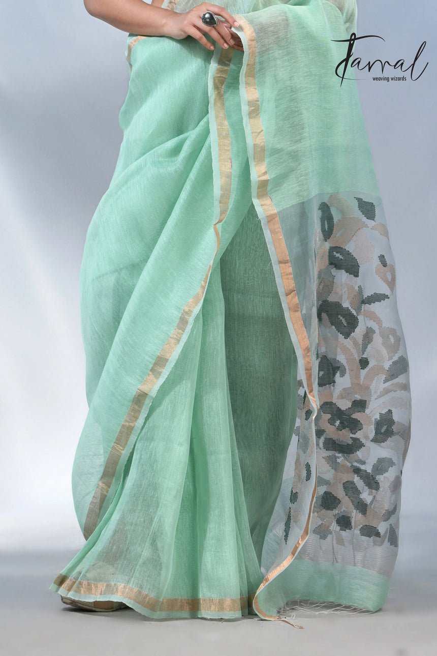 Mint green colour in the silk linen handwoven jamdani saree