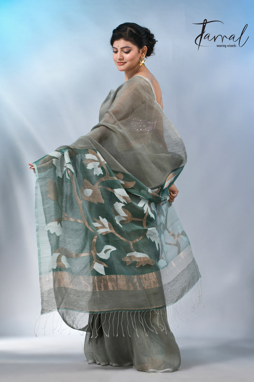 Moss green floral pallu silk linen handwoven jamdani saree