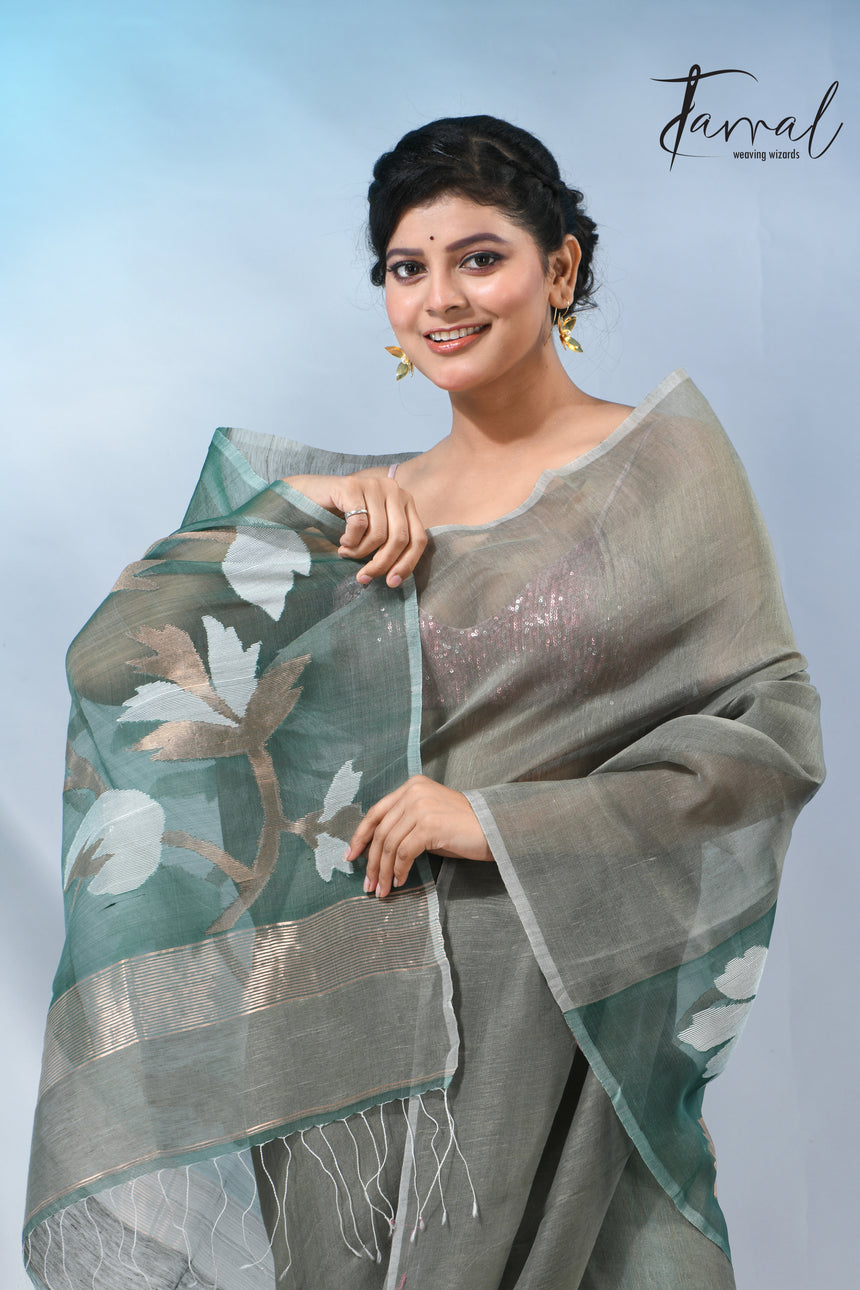 Moss green floral pallu silk linen handwoven jamdani saree