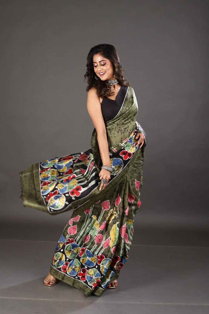 Moss green with multi colour lotus hand batik katan silk saree - Tamal Boutique