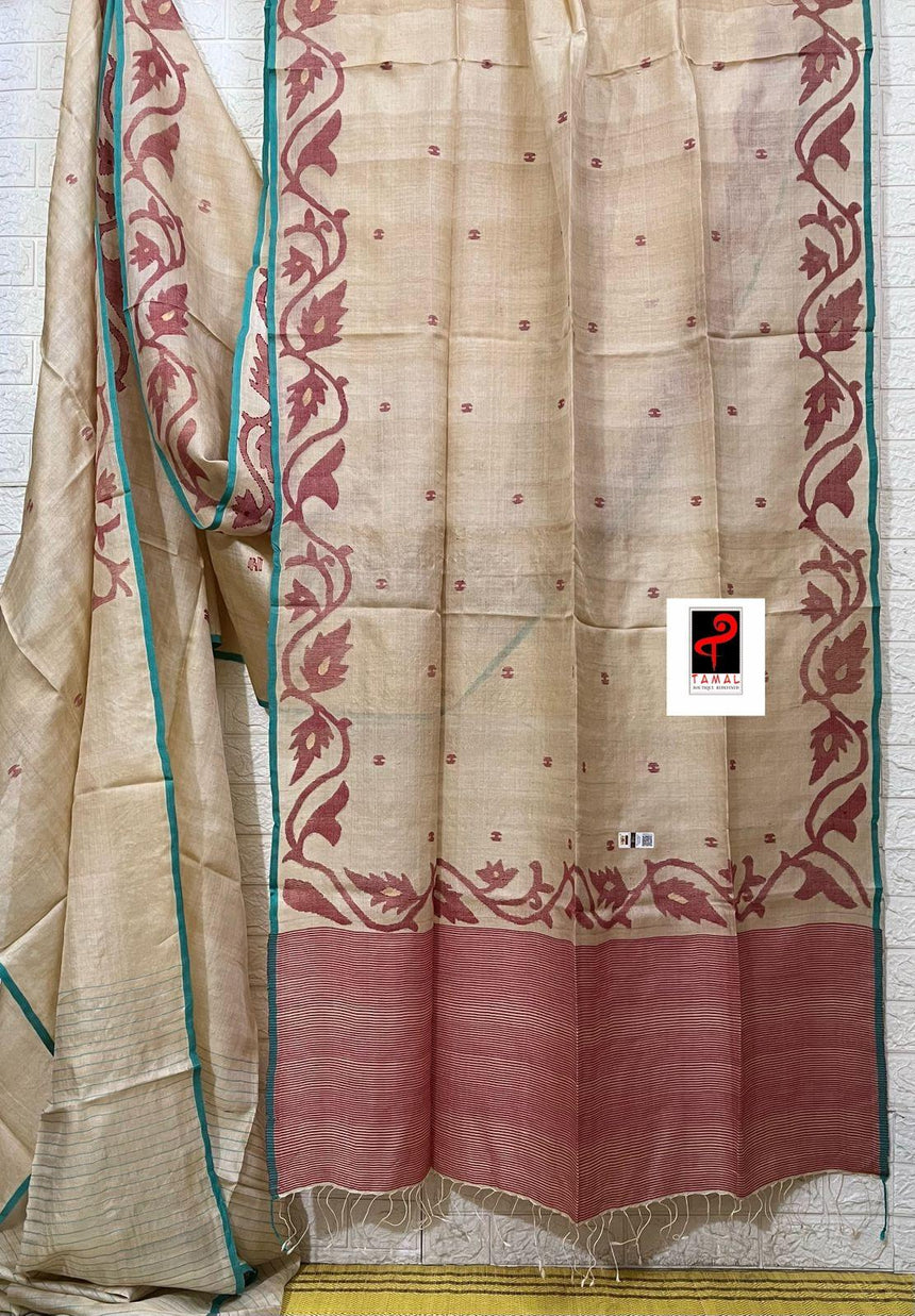 Natural tusser with firoza border alpona motifs handwoven jamdani saree - Tamal Boutique