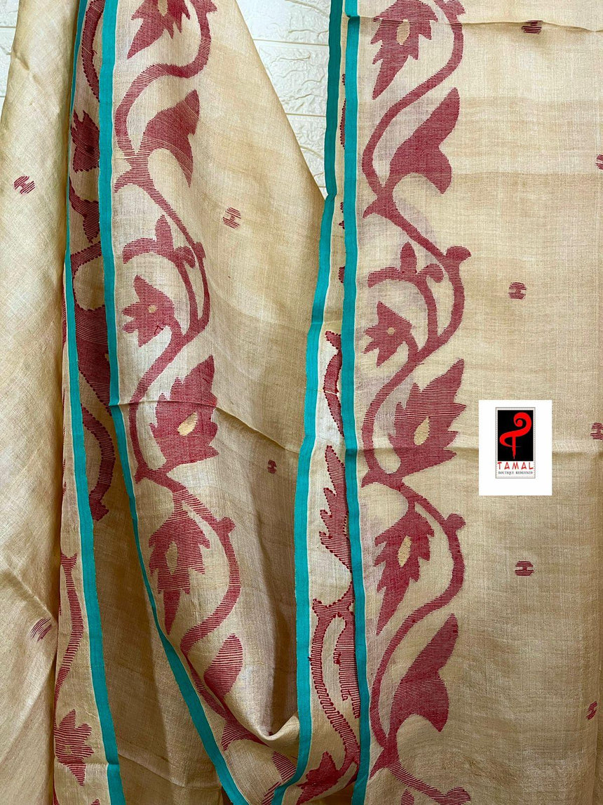 Natural tusser with firoza border alpona motifs handwoven jamdani saree - Tamal Boutique