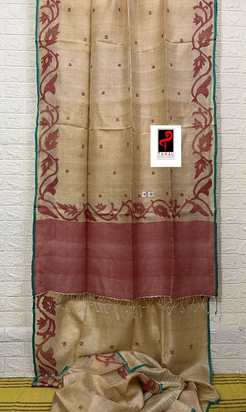Natural tusser with firoza border alpona motifs handwoven jamdani saree - Tamal Boutique
