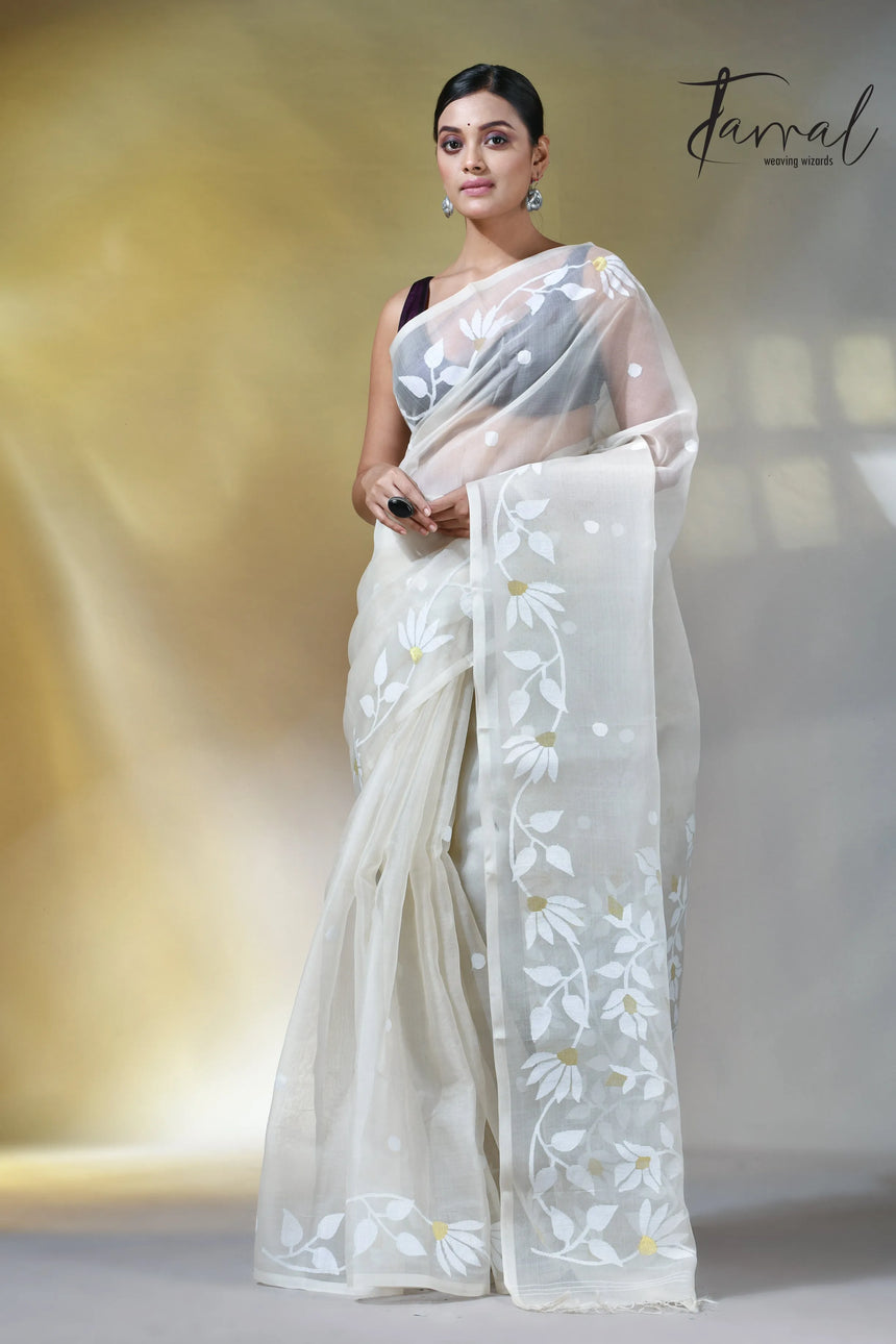 Off white self floral in handwoven muslin silk jamdani saree