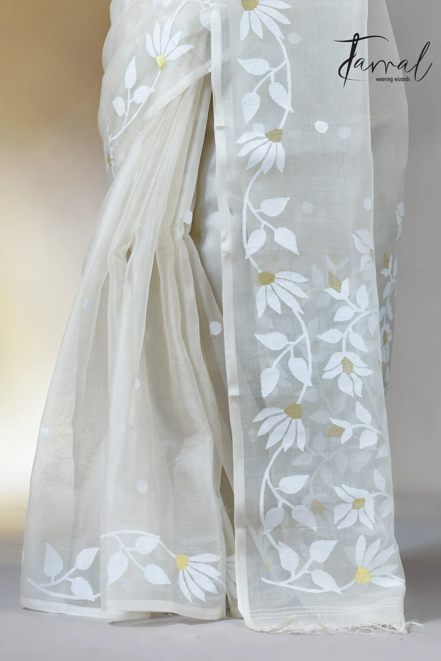 Off white self floral in handwoven muslin silk jamdani saree