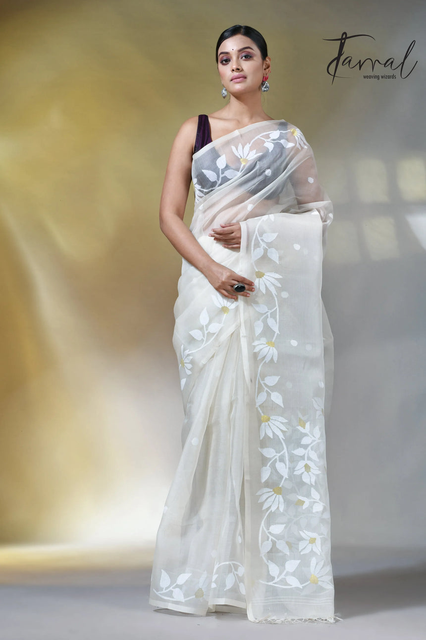 Off white self floral in handwoven muslin silk jamdani saree