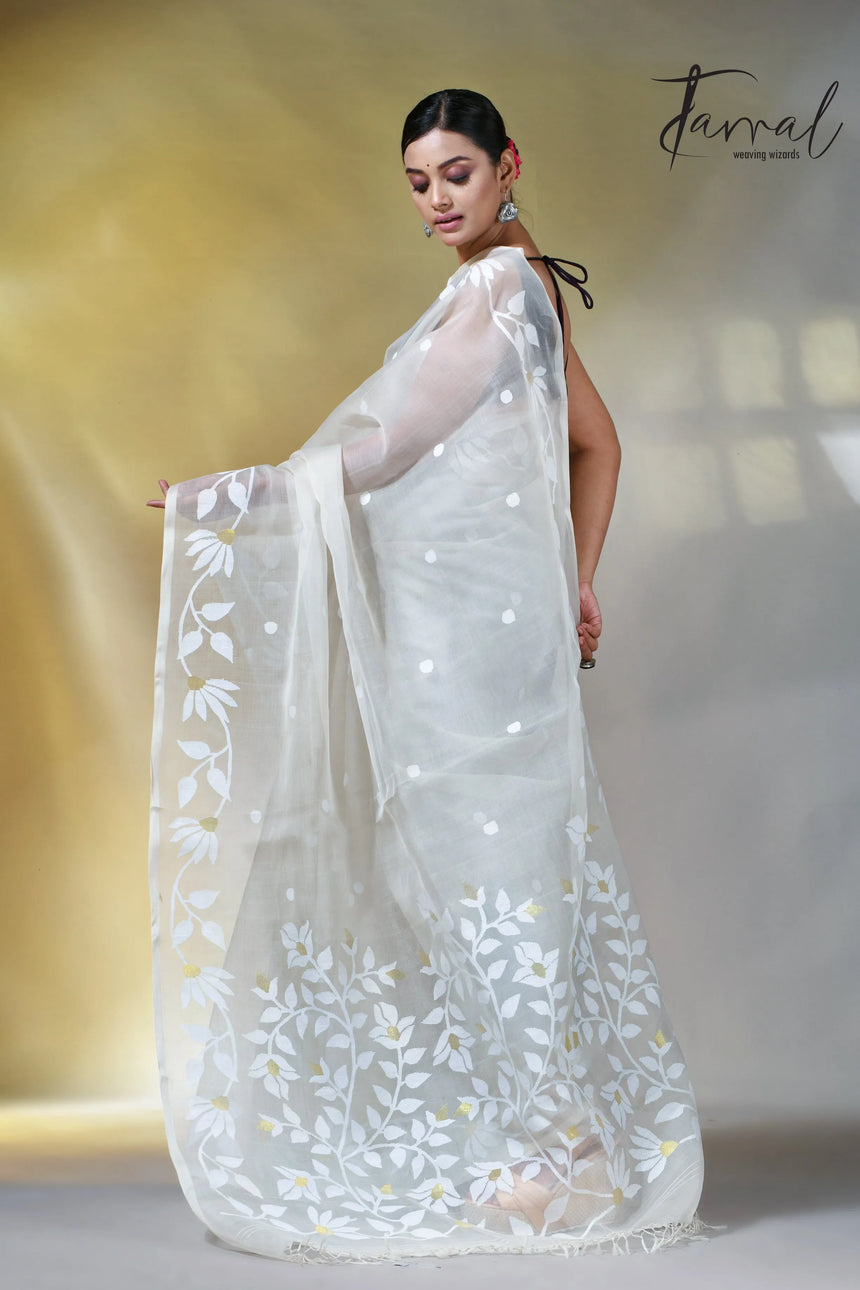 Off white self floral in handwoven muslin silk jamdani saree