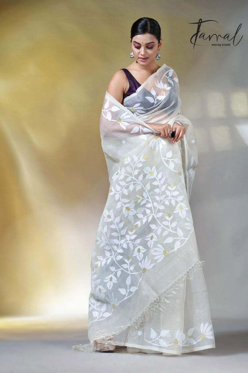 Off white self floral in handwoven muslin silk jamdani saree