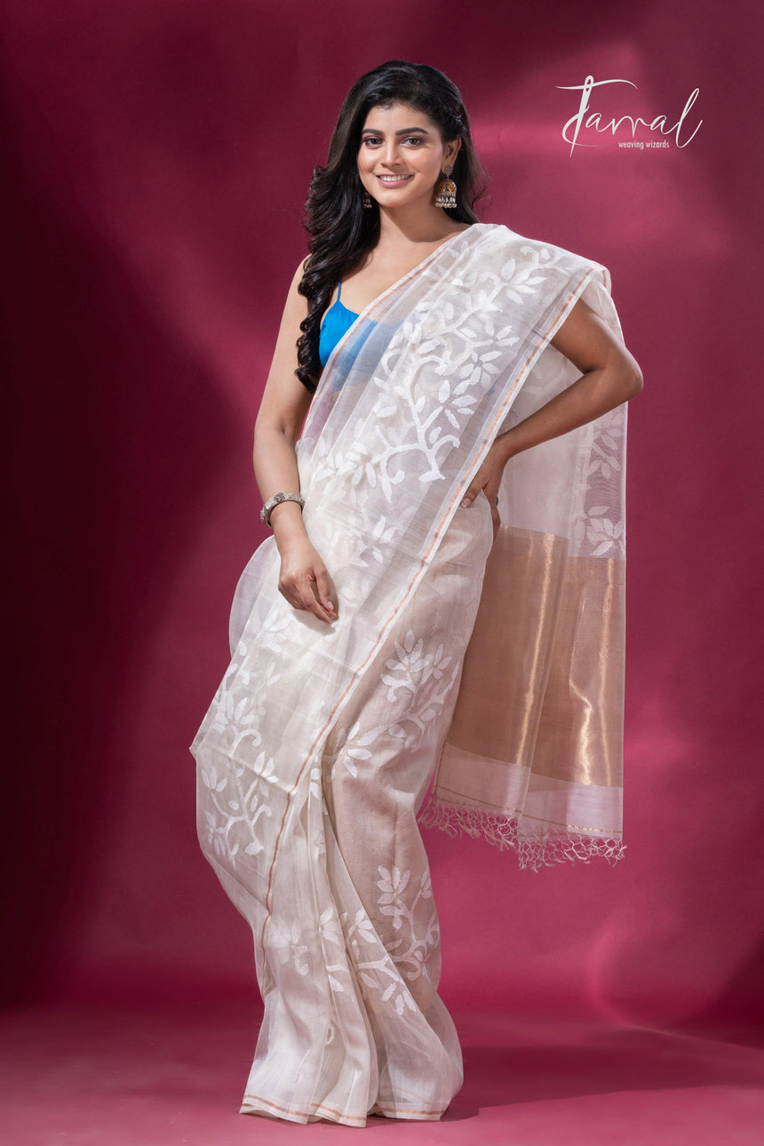 Off white with floral handwoven jamdani in muslin silk saree