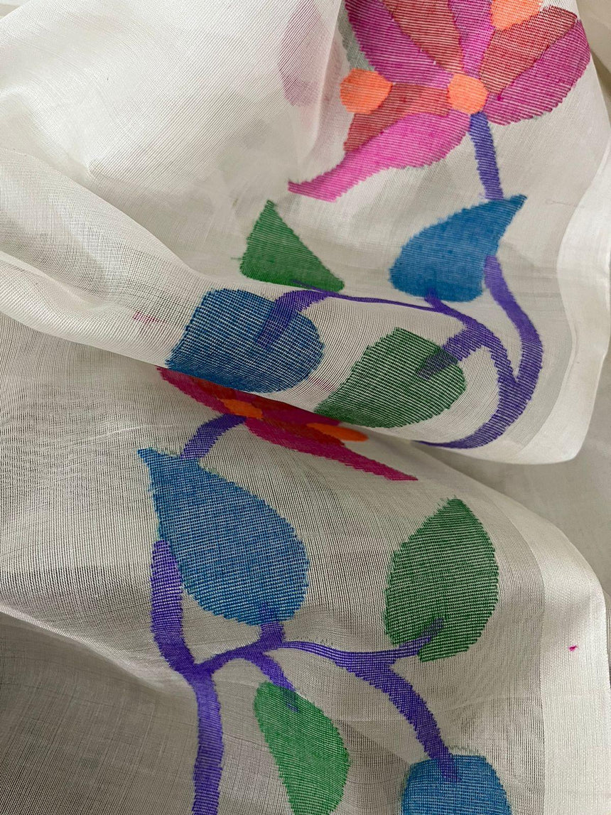 Offwhite with multi floral border with all over buta handwoven jamdani saree in muslin silk - Tamal Boutique