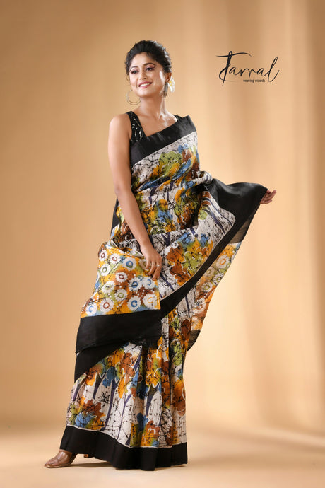 Offwhite with black border handcrafted batik pure silk saree
