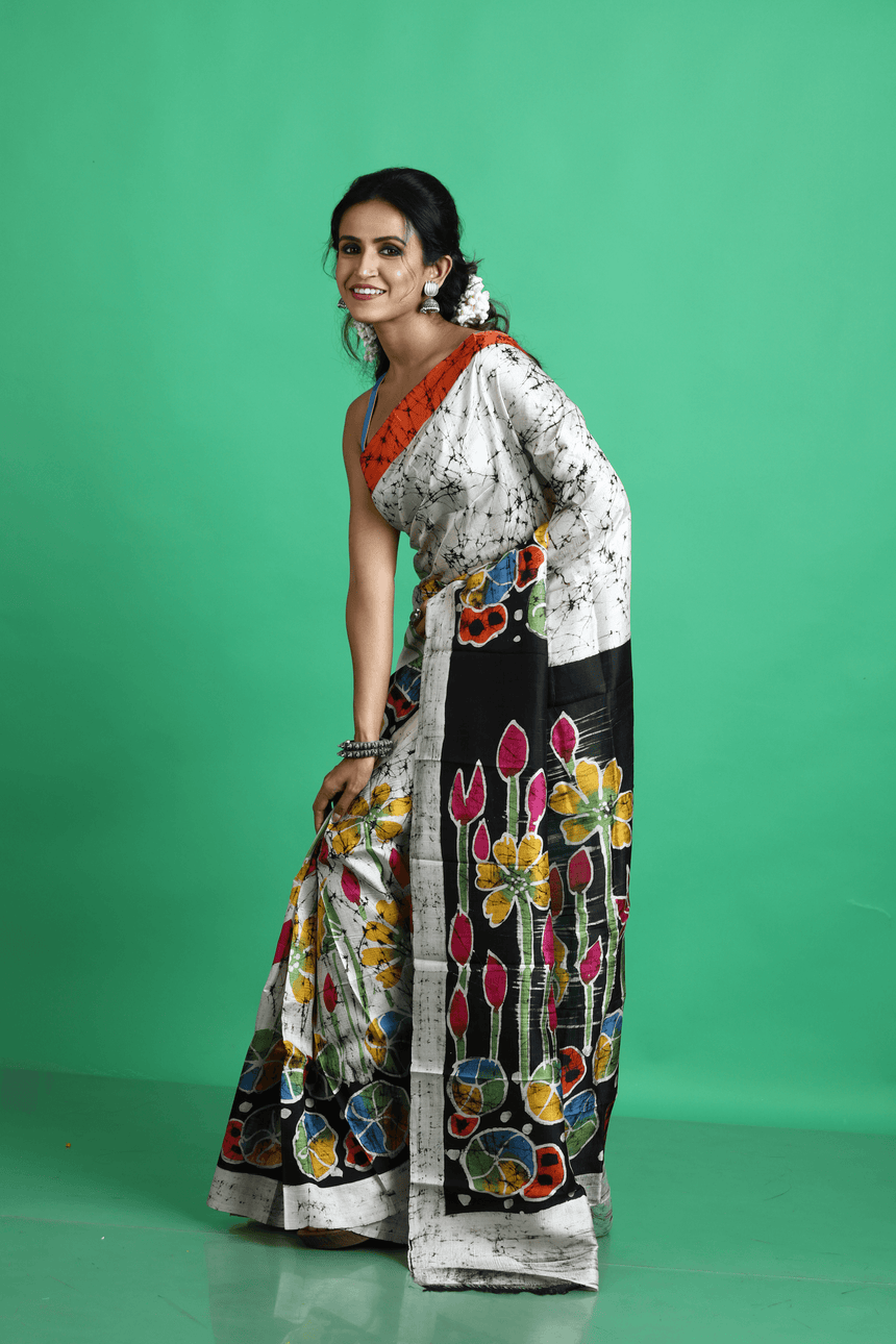 Offwhite with multicolor lotus handcrafted batik silk saree