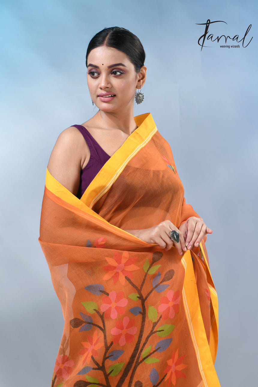Orange colour muslin silk floral handwoven jamdani saree
