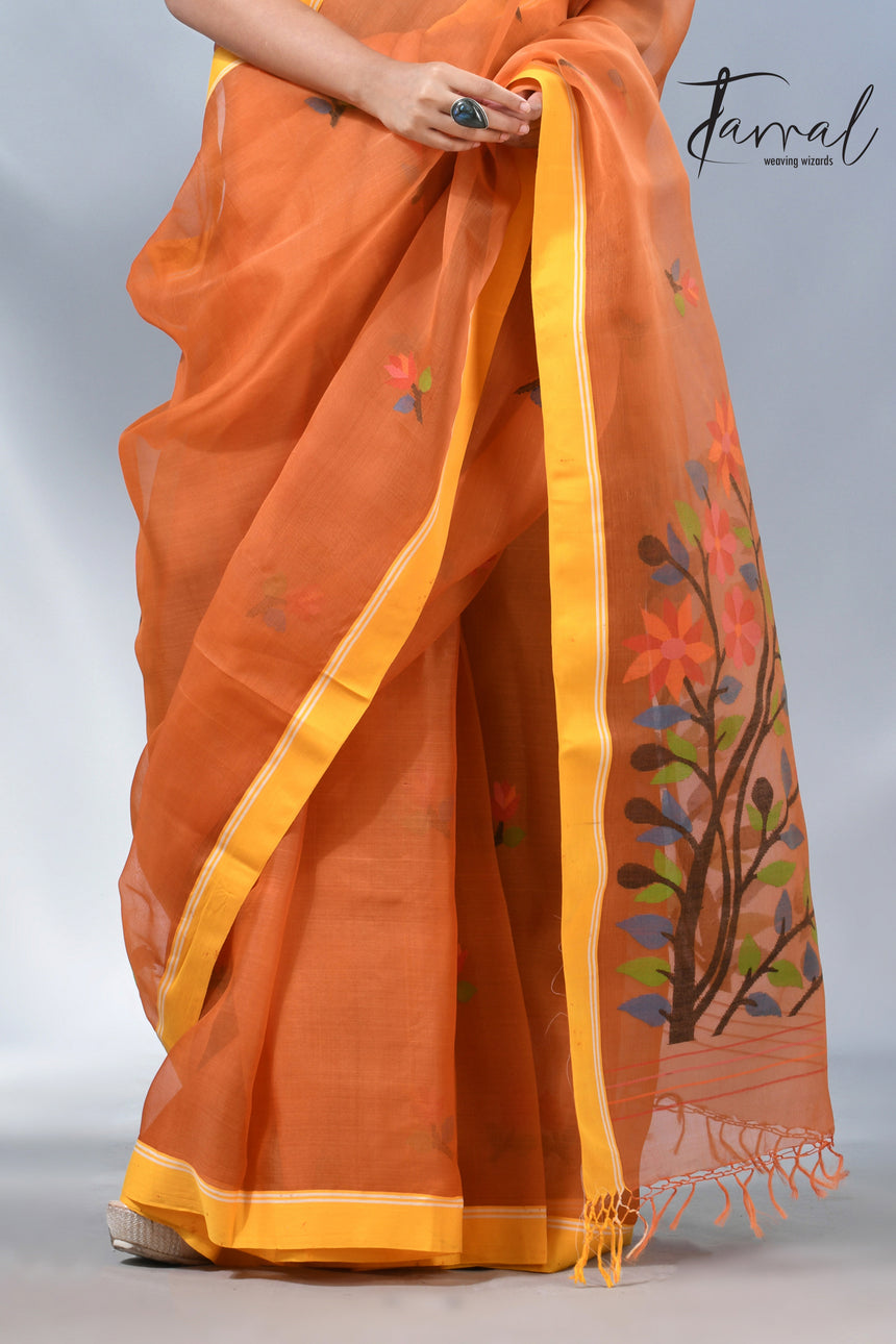 Orange colour muslin silk floral handwoven jamdani saree