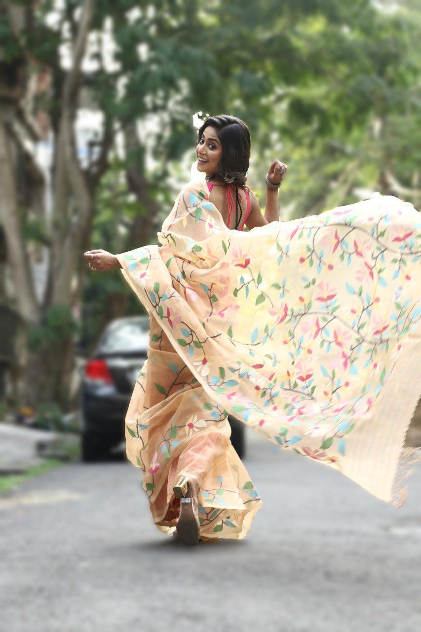 Peach with multi colour floral handwoven muslin silk jamdani saree - Tamal Boutique