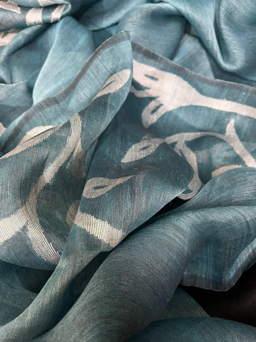 Peacock blue with skirt border floral handwoven silk linen jamdani saree - Tamal Boutique