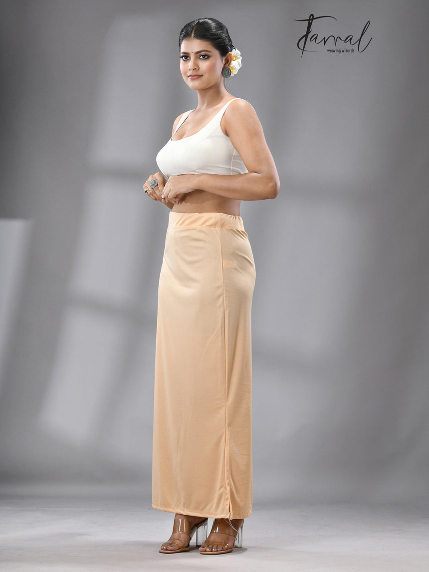 Cream Color Fish Cutting Lycra Stretchable Free Size Petticoat - Tamal Boutique