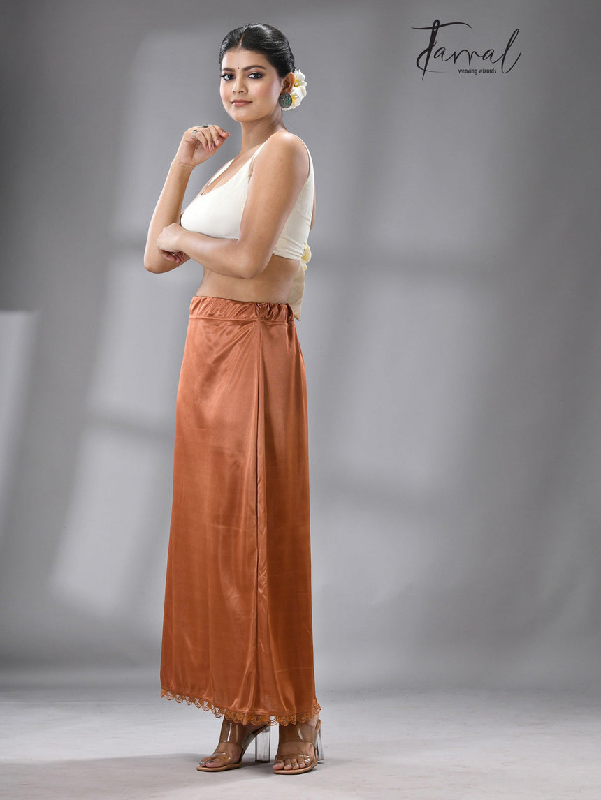 LIGHT ORANGE LYCRA STRETCHABLE PETTICOAT - Tamal Boutique