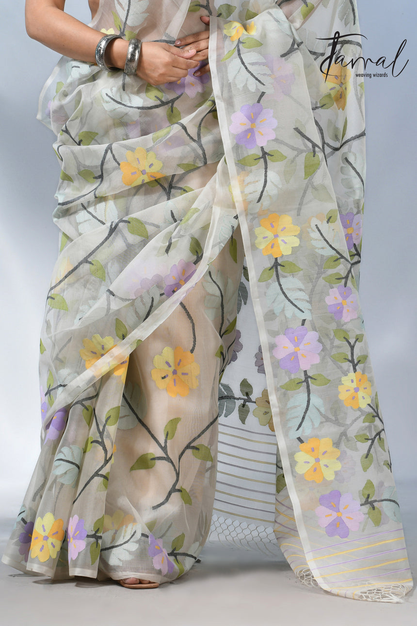 Offwhite Muslin Silk Saree with Allover Multicolour Floral Weave