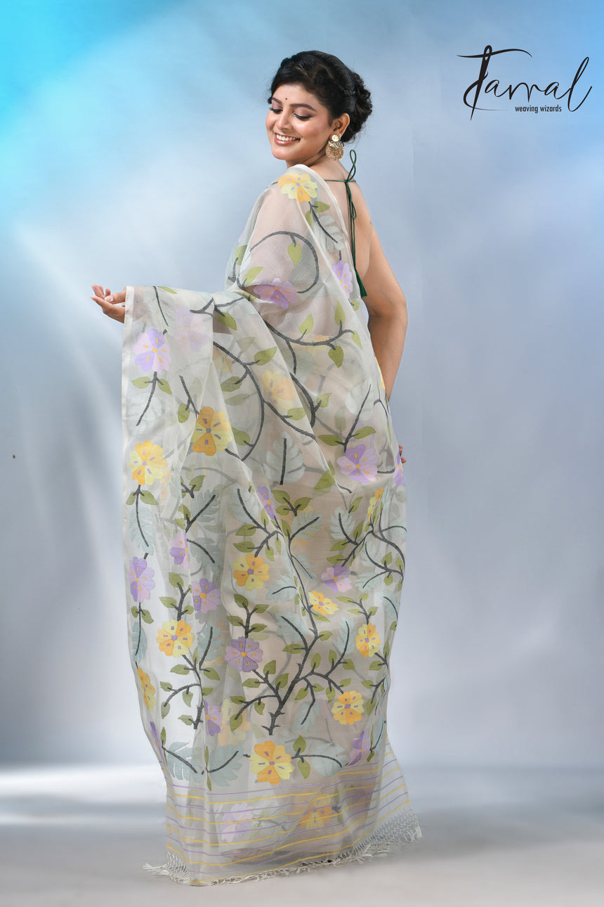 Offwhite Muslin Silk Saree with Allover Multicolour Floral Weave