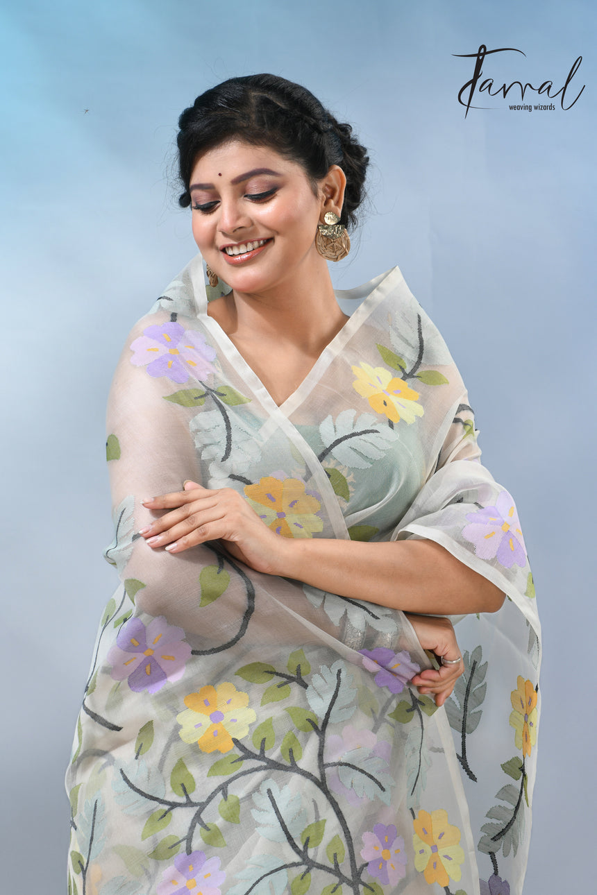 Offwhite Muslin Silk Saree with Allover Multicolour Floral Weave