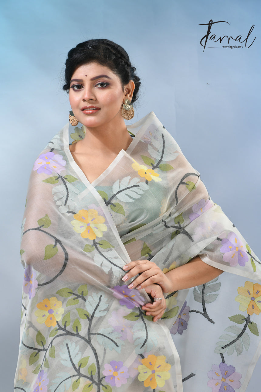 Offwhite Muslin Silk Saree with Allover Multicolour Floral Weave
