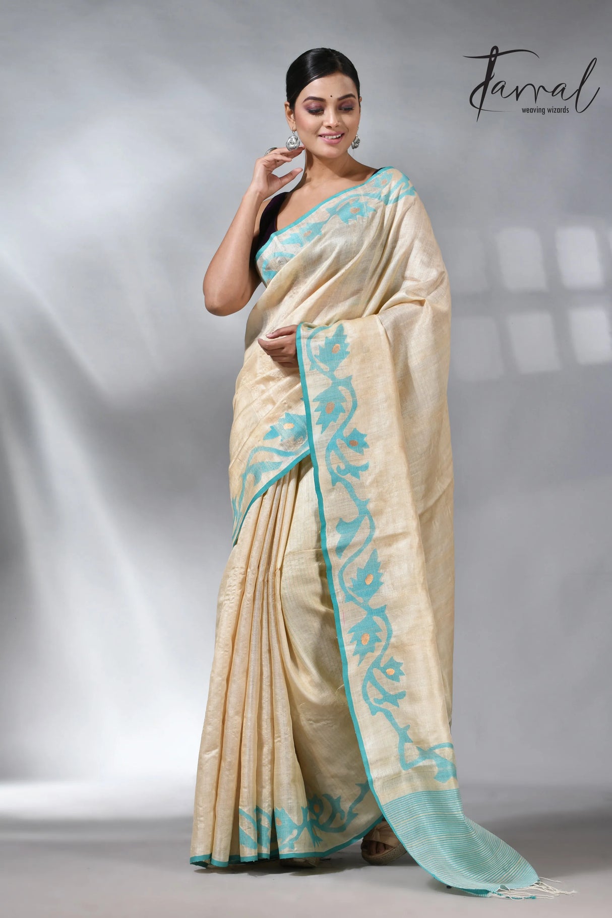 Beige with firoza border lata border tusser silk handwoven jamdani saree