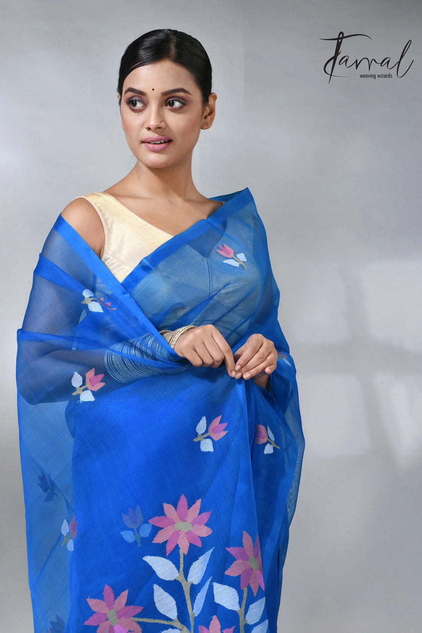 Sea blue colour in floral muslin silk handwoven jamdani saree