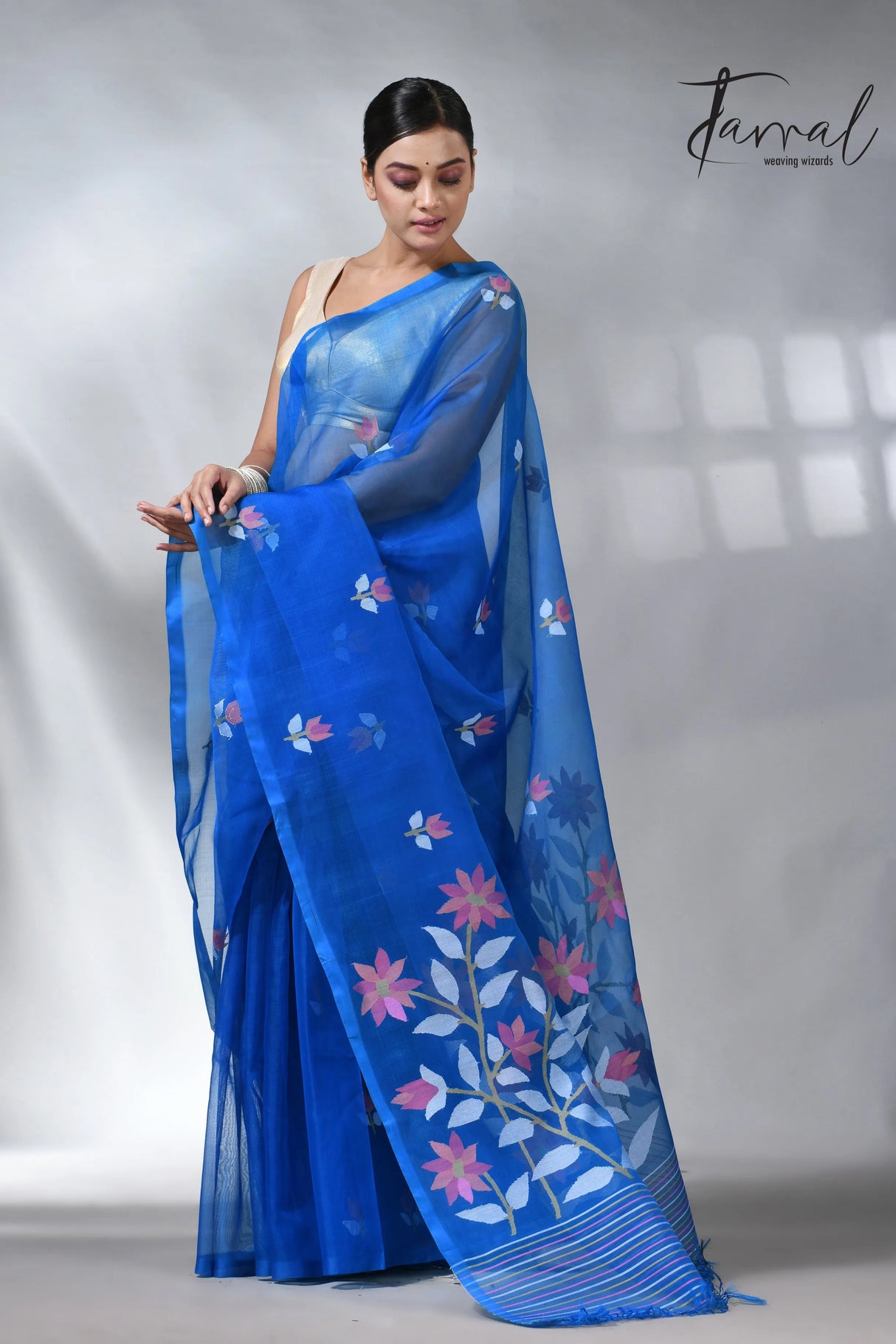 Sea blue colour in floral muslin silk handwoven jamdani saree