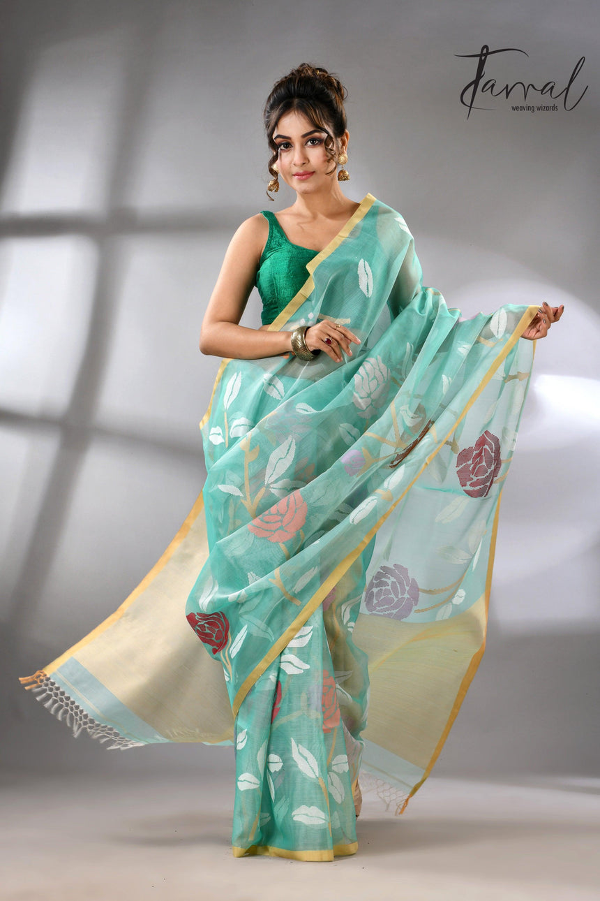 Sea green handwoven needle work jamdani saree_Front