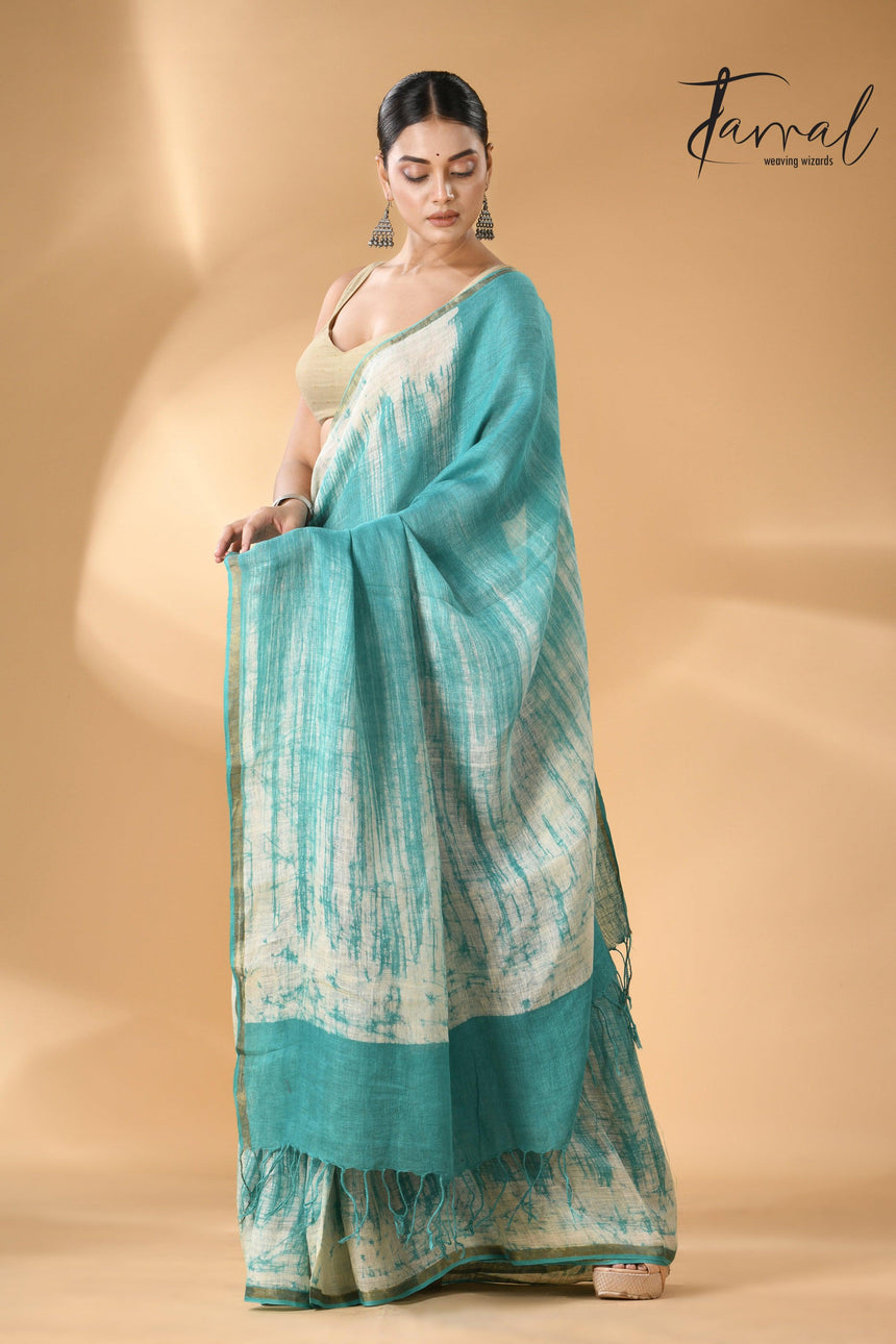 Sea green with white linen handcrafted batik saree left