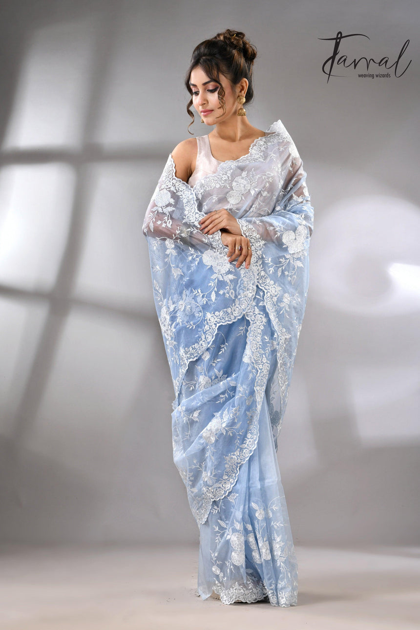 Sky blue organza embroidered handloom saree left