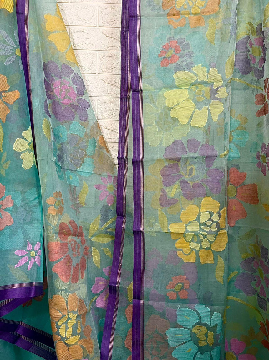 Turquoise blue with allover seasonal floral motifs handwoven muslin silk jamdani saree - Tamal Boutique
