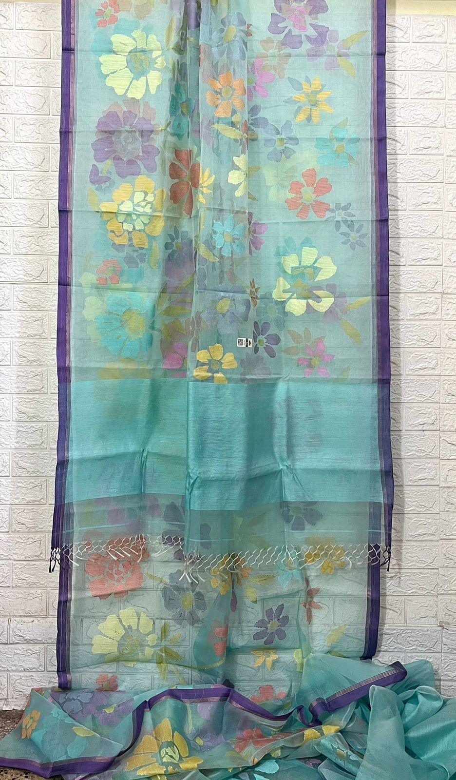 Turquoise blue with allover seasonal floral motifs handwoven muslin silk jamdani saree - Tamal Boutique