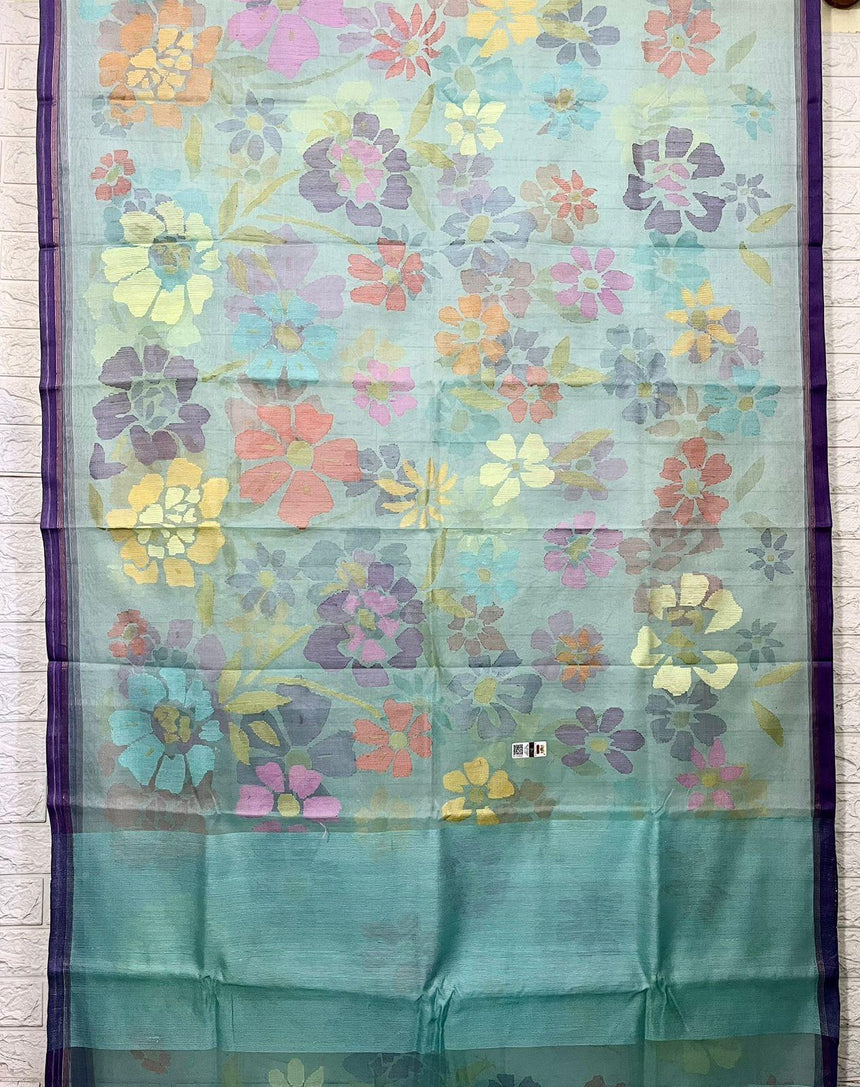 Turquoise blue with allover seasonal floral motifs handwoven muslin silk jamdani saree - Tamal Boutique