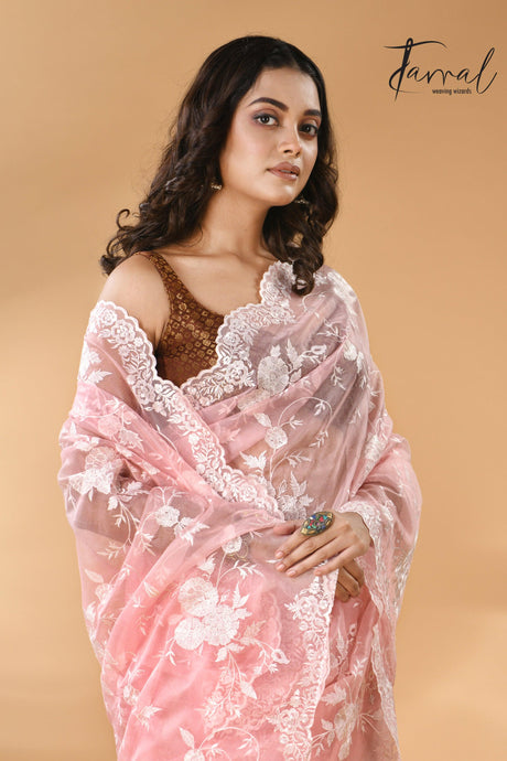 Baby pink organza embroidered handloom saree closeup